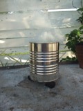 smoking charcoal chimney in coffee can